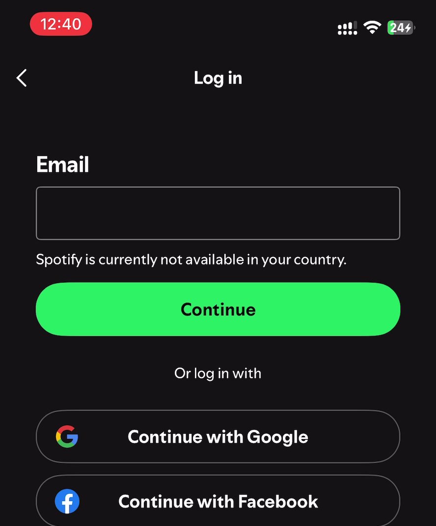 Spotify 로그인 화면. “Spotify is currently not available in your country.”